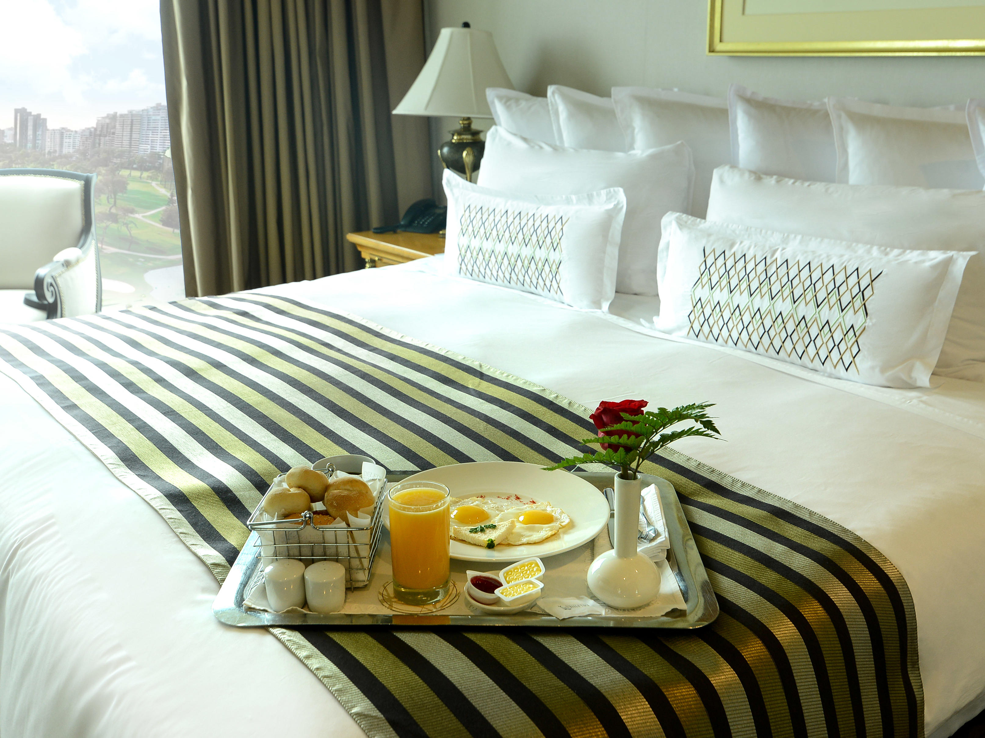 Breakfast in bed in the Olimpo Suite at Delfines Hotel