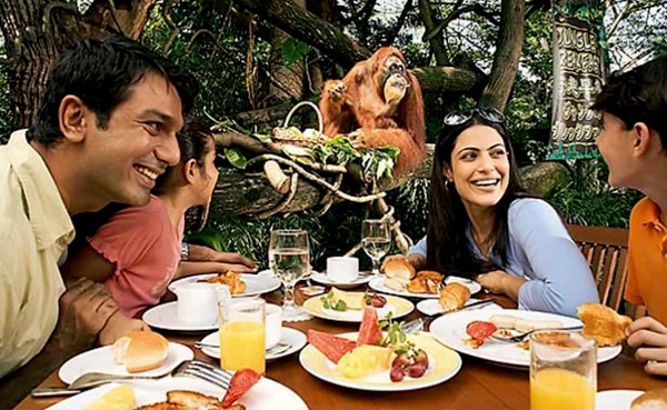 A family enjoying their meal at Singapore Zoo near The Fullerton Hotel Singapore
