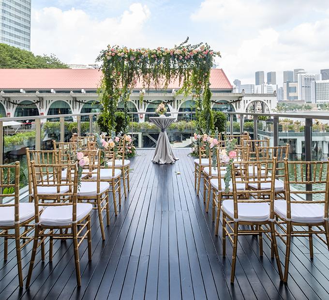 Chair set-up with flower décor in Floating Pods at The Fullerton Hotel Singapore