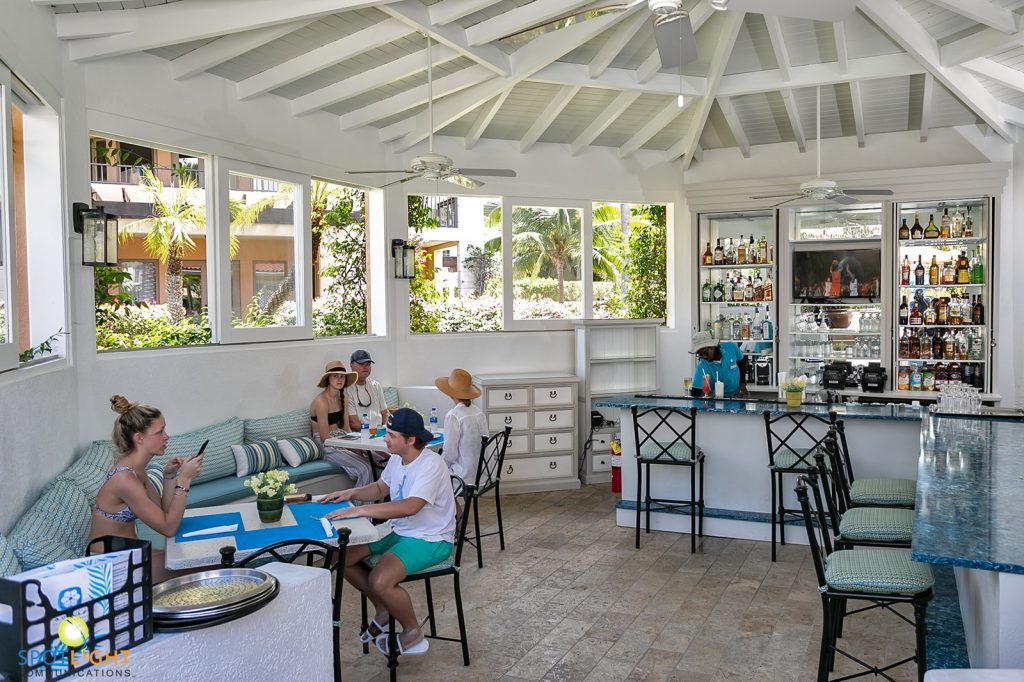 Guests in LunaSea’s bar area at The Somerset on Grace Bay