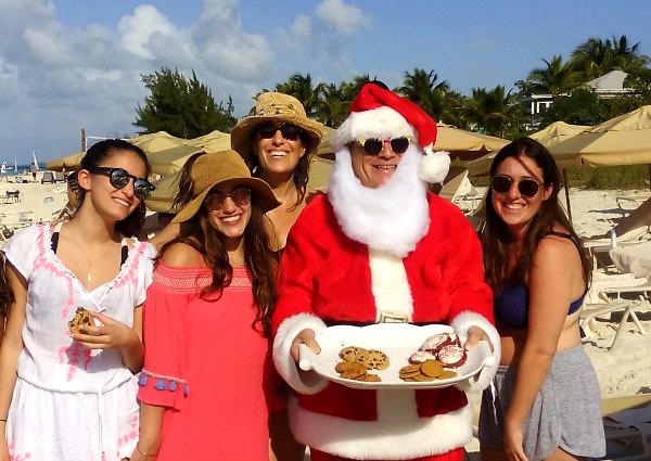 Girls posing, picture with Santa at The Somerset On Grace Bay