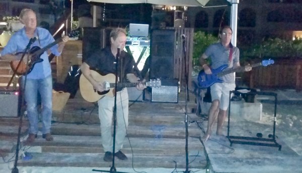 Three people performing at The Somerset On Grace Bay
