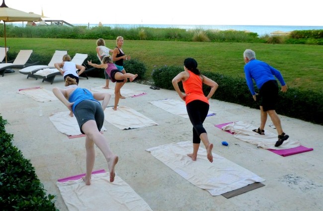 People engaged in Pilates Fitness at The Somerset On Grace Bay