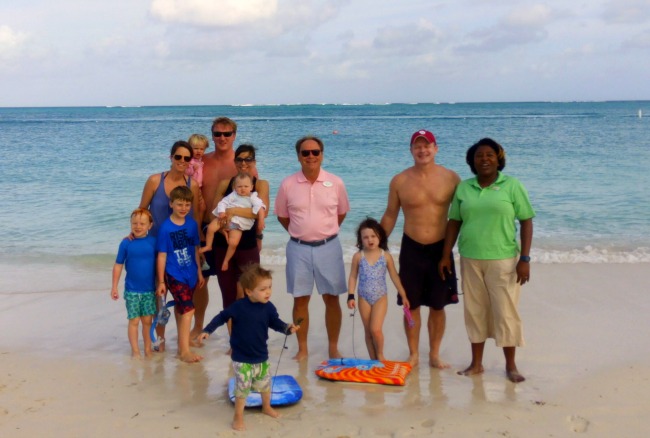 Family posing for a picture near The Somerset On Grace Bay