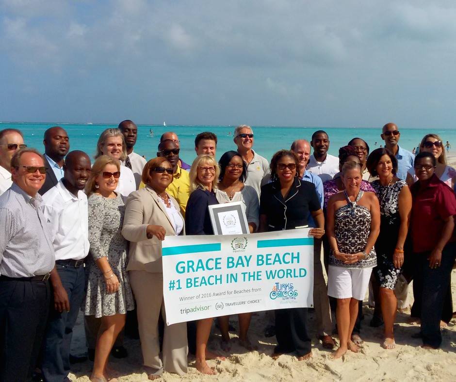 Group of people posing for a picture, The Somerset On Grace Bay