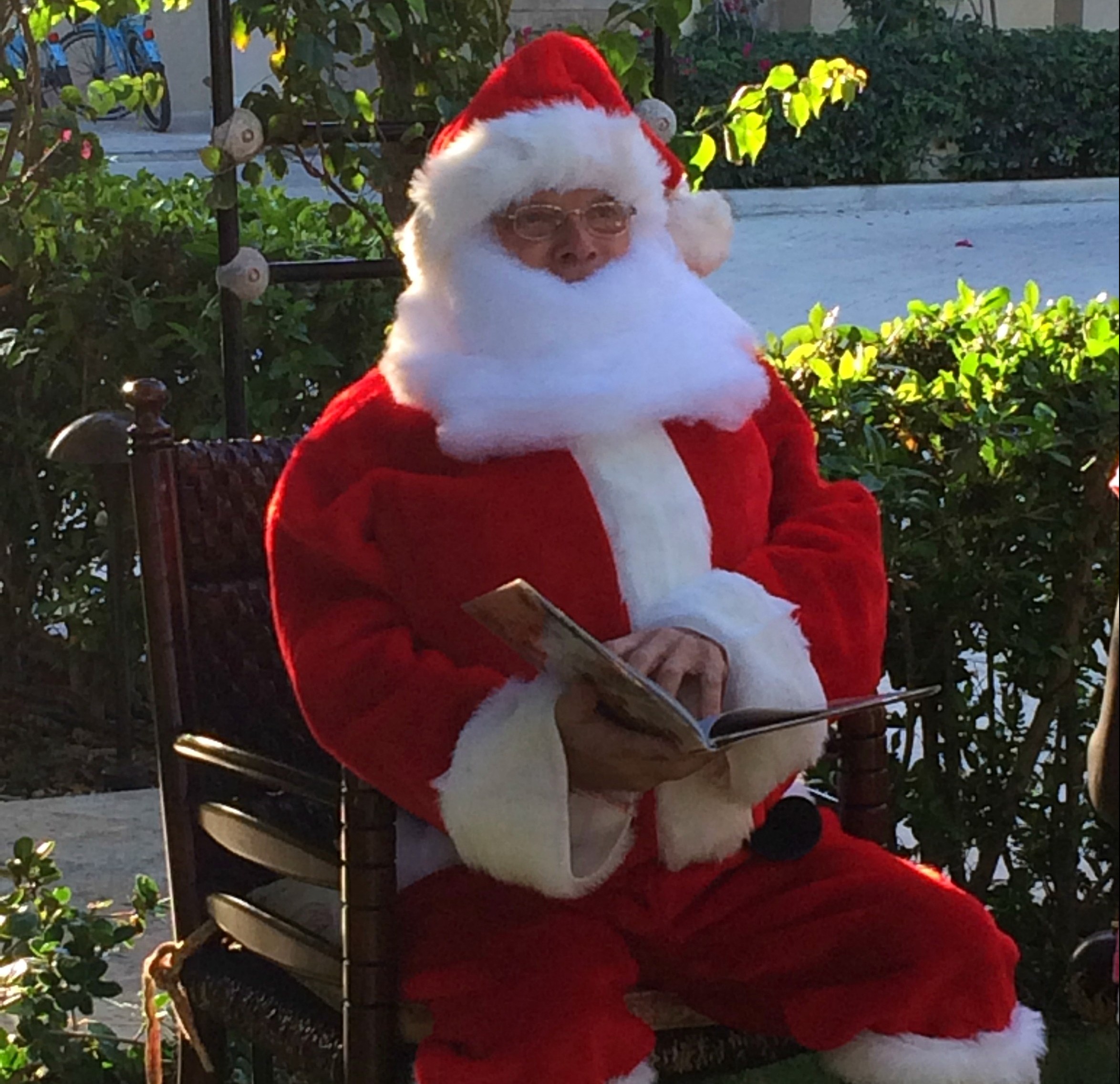 Santa clause with a magazine at The Somerset on Grace Bay