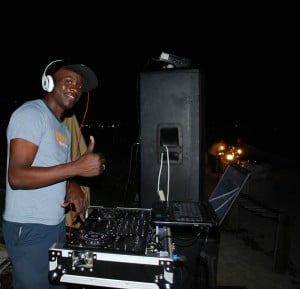 DJ Snoopi posing at night at The Somerset on Grace Bay